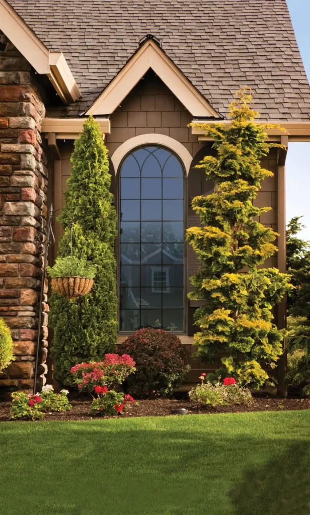 Gentek 80 Series arched window, viewed from the outside of a beautiful home
